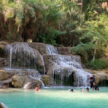 Swimming below Kuang Si Waterfalls