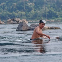 Fisherman an the way to the Irrawaddy Dolphins in Mekong