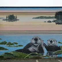 Sea Otters on the wall of the Civic Center of Prince Rupert