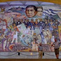Mural with Mexican's nacional hero Benito Juarez (biggest head on top) in the Palacio de Gobierno