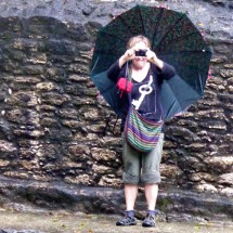 Marion taking a picture in the rain