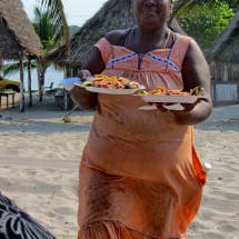 African Lady serving food