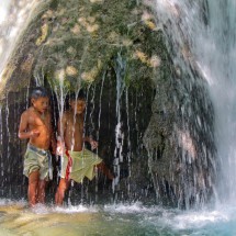 The two boys with the cave behind the waterfall