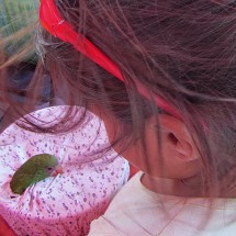 Girl with green parrot