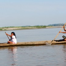 Two Ladies in a logboat