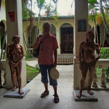 Two beauties of different tribes with Alfred in the museum Museo Amazonica