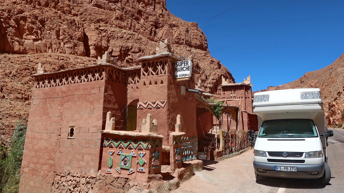 A supermarket and our camper in the Dades Gorge in 2024