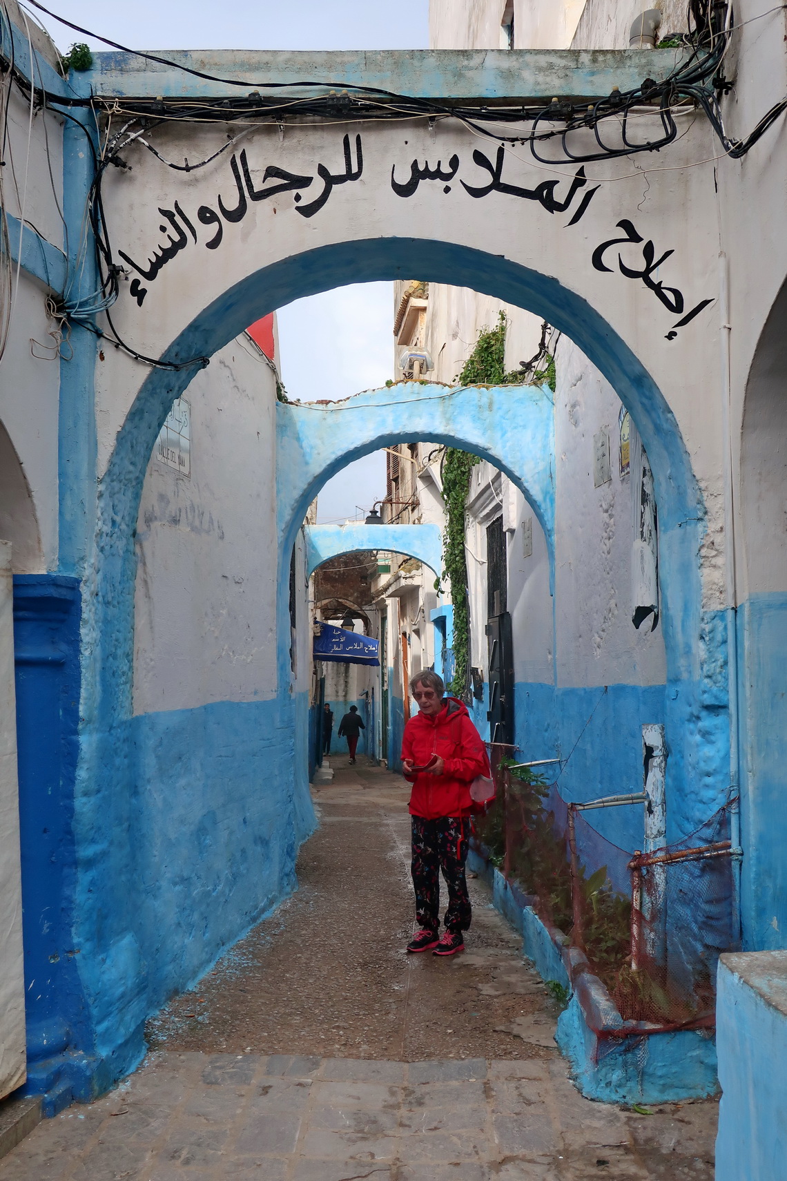 Jutta in a narrow alley of Larache's Medina
