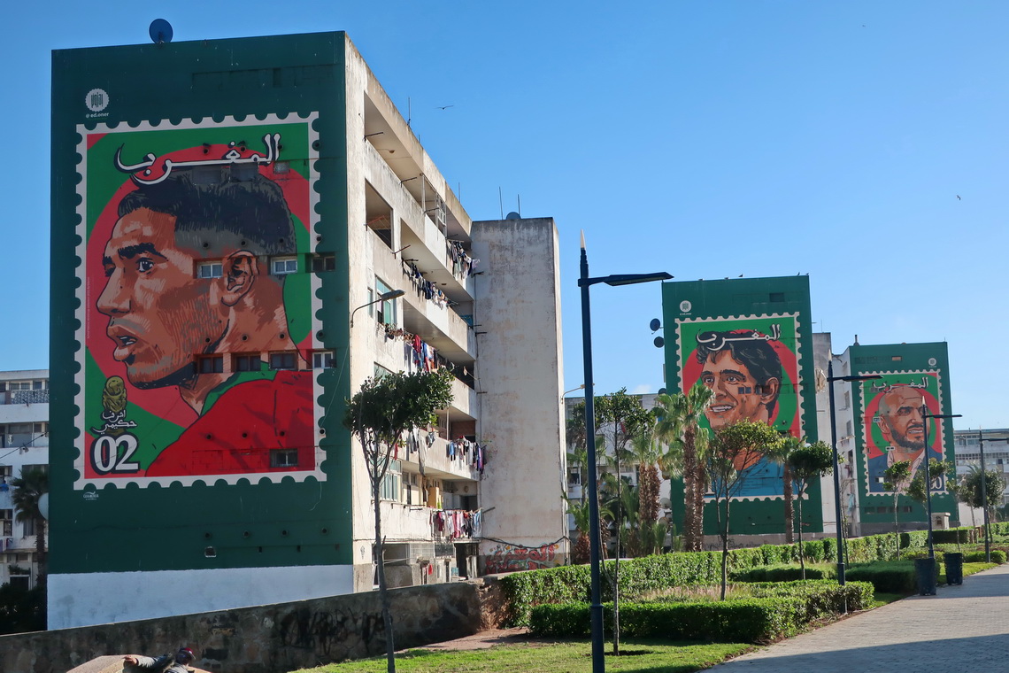 Apartment buildings with stamps showing Moroccan football heroes