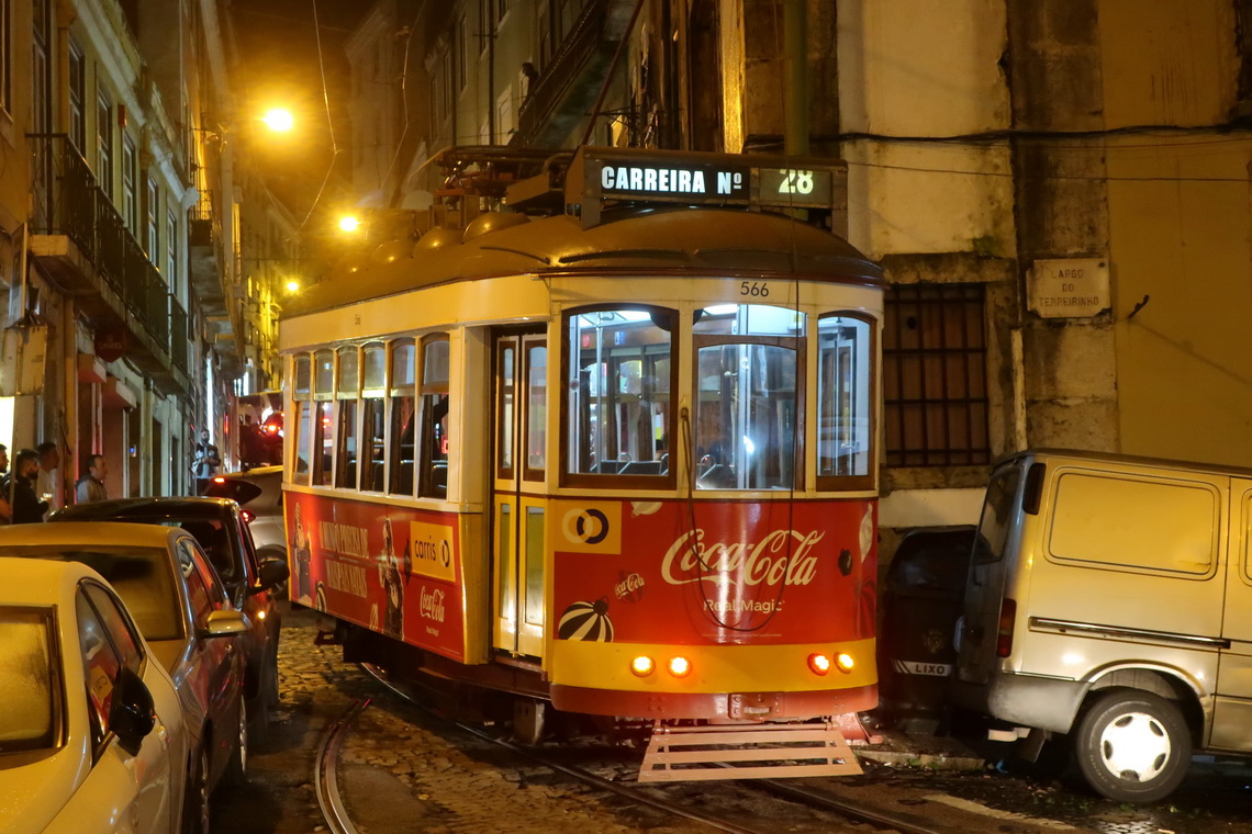 Stuck ancient tram in Lisbon due to too many cars in a very narrow street - an unbelievable chaos