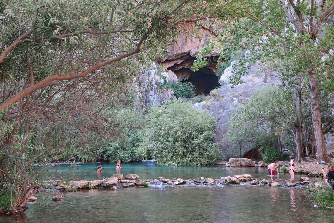 Ice-cold lake with cave Cueva de Gato