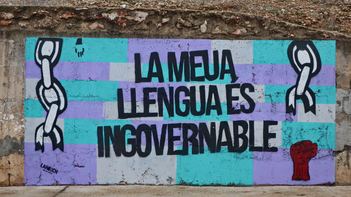 Mural in Simat de la Valldigna with a message in Valencian language - Our language is ungovernable