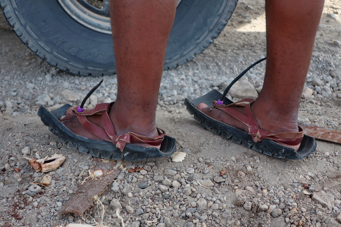 Tire with sandals made with used tires