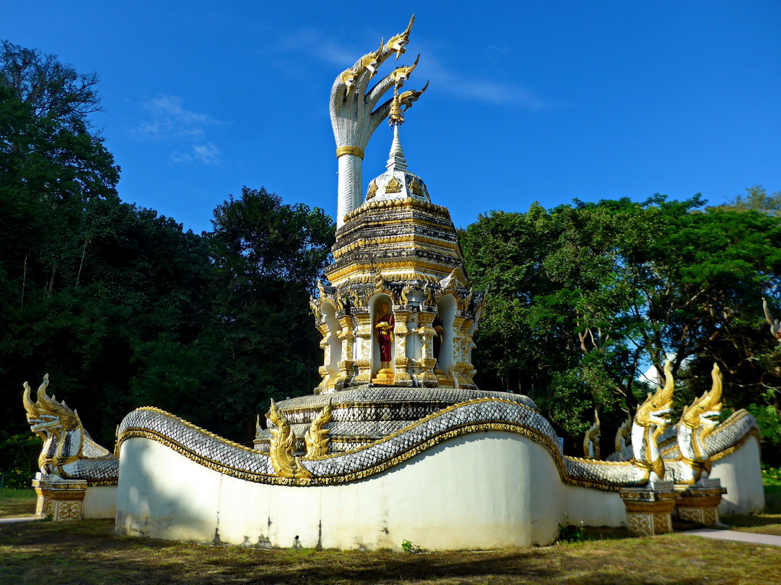 One of the many temples of the Wat Tham complex