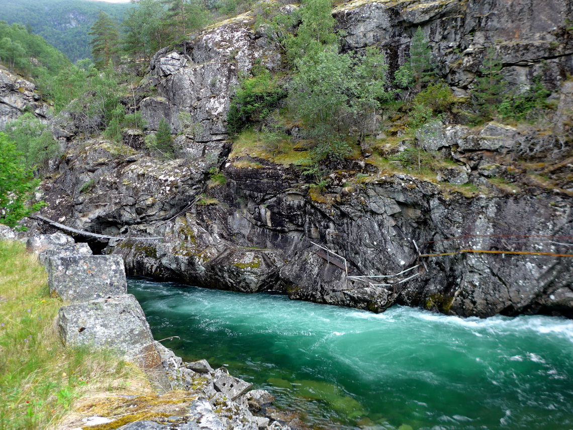 Turquoise water of the river Lærdalselvi - Note the paths in the rocks for fishermen!