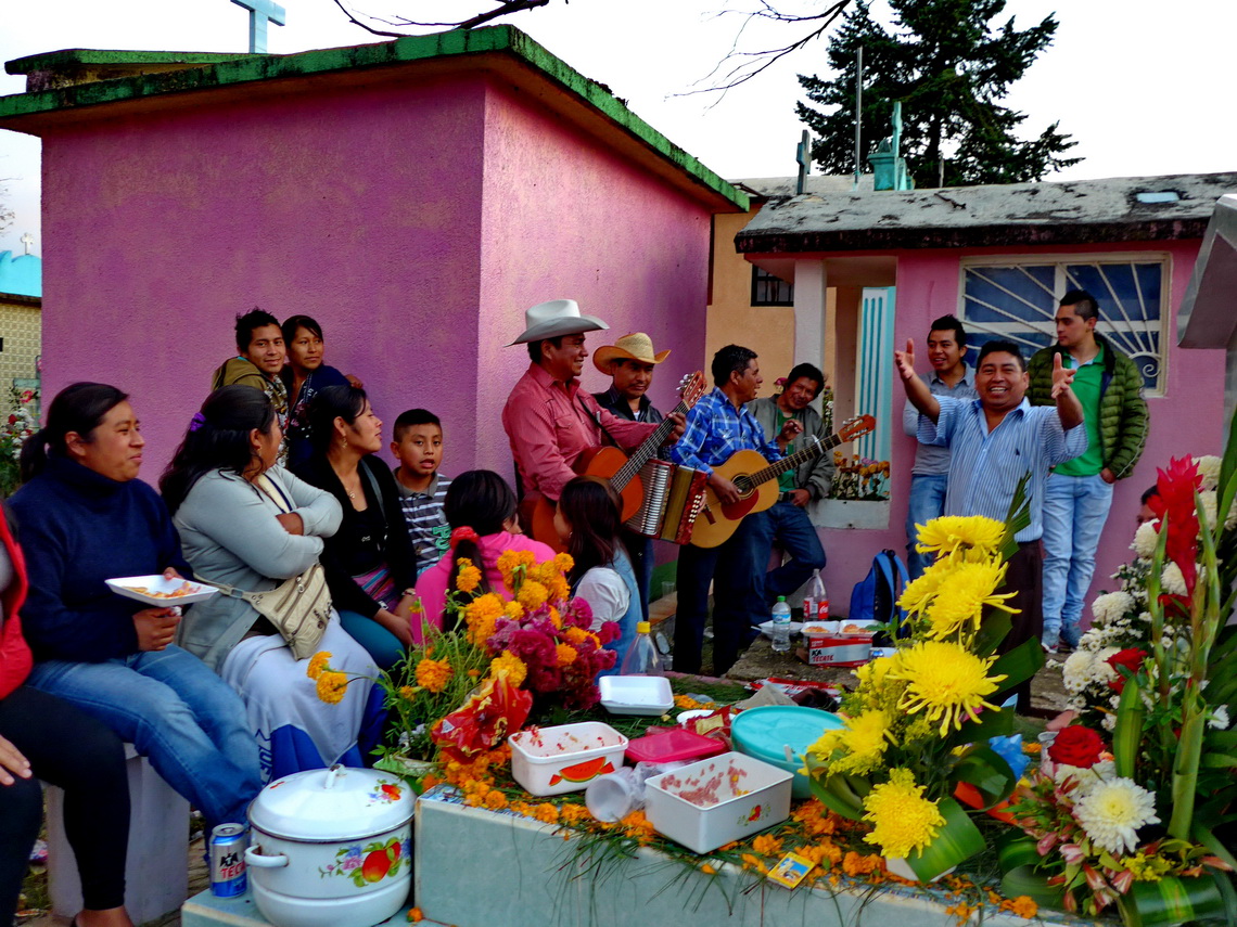Typical Mexican All Soul's Day celebration on the cemetery