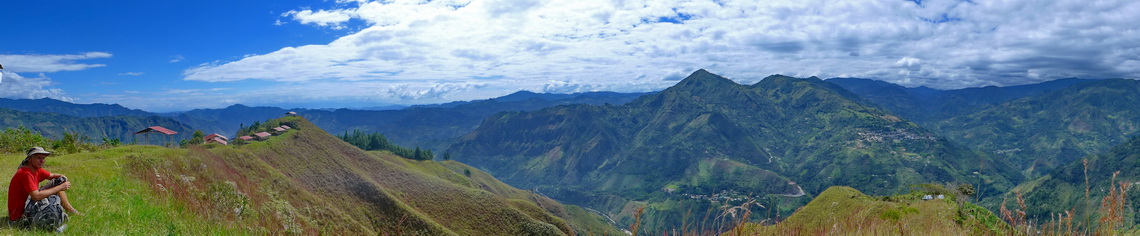 On the summit of El Aguacate (2042 meters sea-level) with the roofs of the graves on the left side