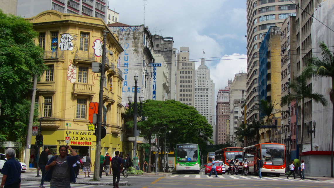 Avenida Sao Joao nearby Praca da Republia with a social building in yellow