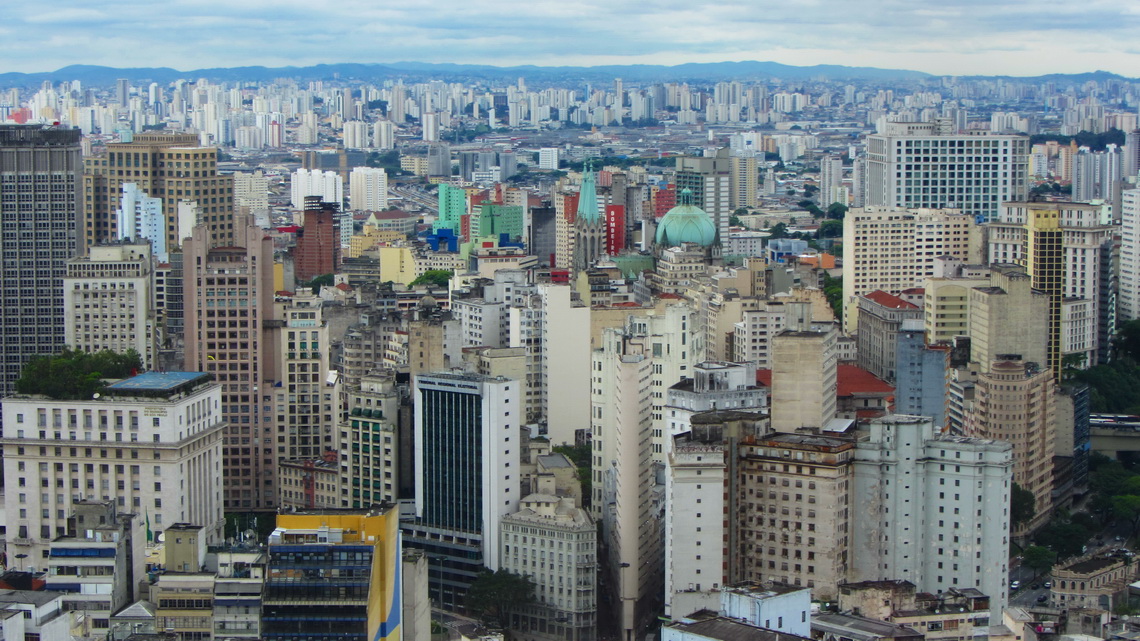 Downtown of Sao Paulo with its cathedral (green roofs in the center of the picture) seen from the top of Edificio Italia