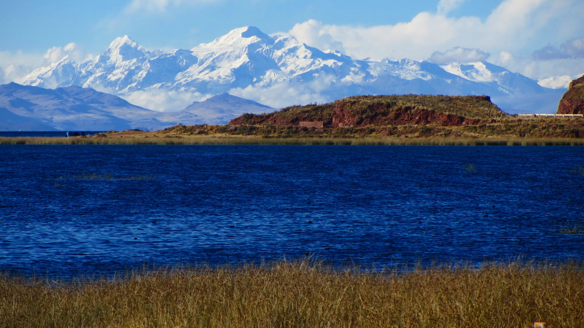 Lake Titicaca with Nevados Illampu and Ancohuma seen from the street to the Peruvian border