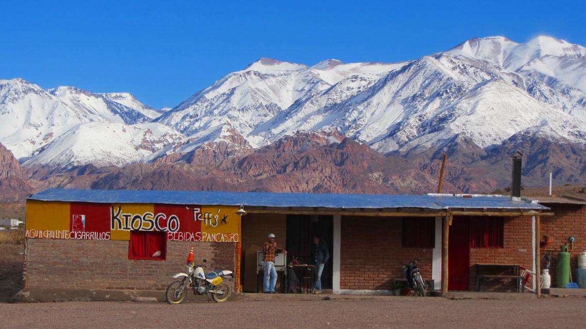 Argentine kiosk on the roadblock with snowy Andes