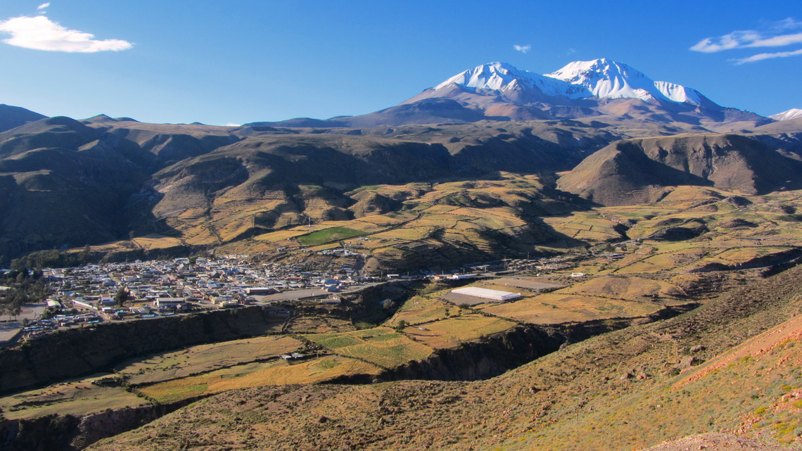 The village of Putre (3600 meters high) with majestic mountains Nevado Putre (approx. 5800 meters)