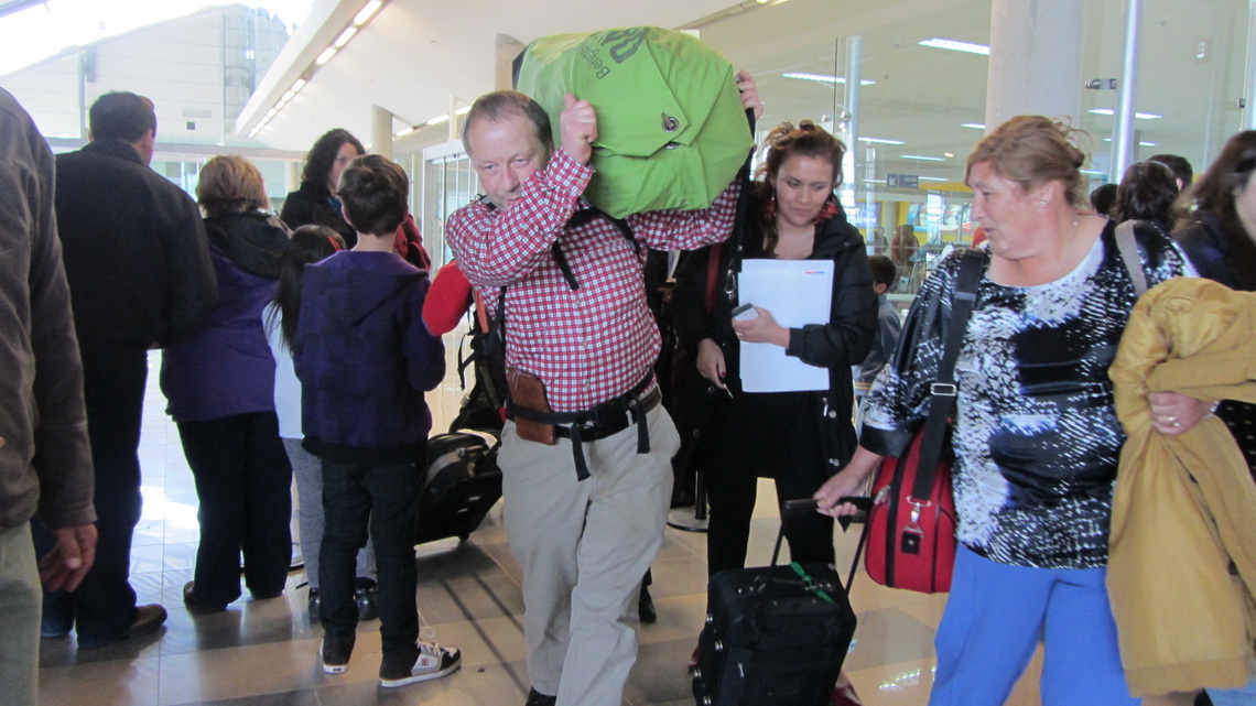 Busy airport of Punta Arenas with Tommy in the center