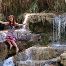 Girl with the lower Kuang Si Waterfall