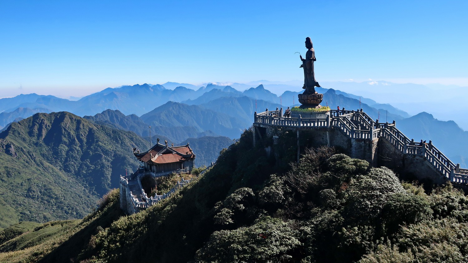 Guan Yin Statue with mountains of Vietnam