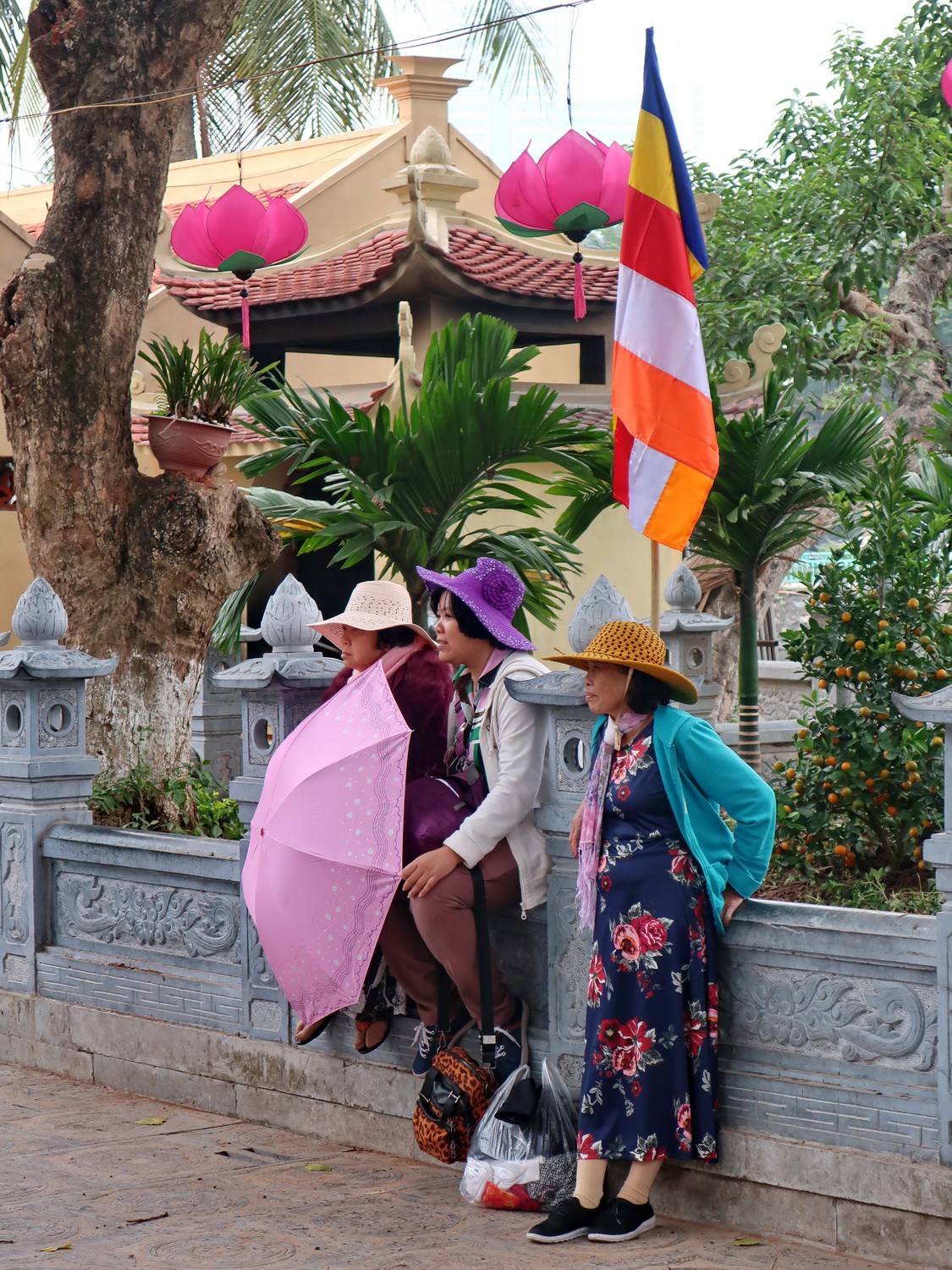 Three Ladies in front of Tran Quoc Pagoda