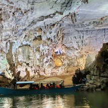 With a boat in the Phong Nha Cave
