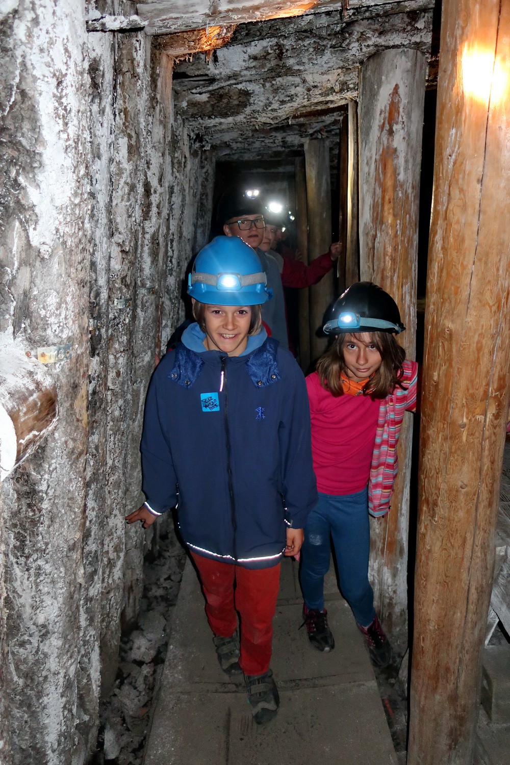 Kids in the tunnel to the mine entry