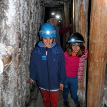 Kids in the tunnel to the mine entry
