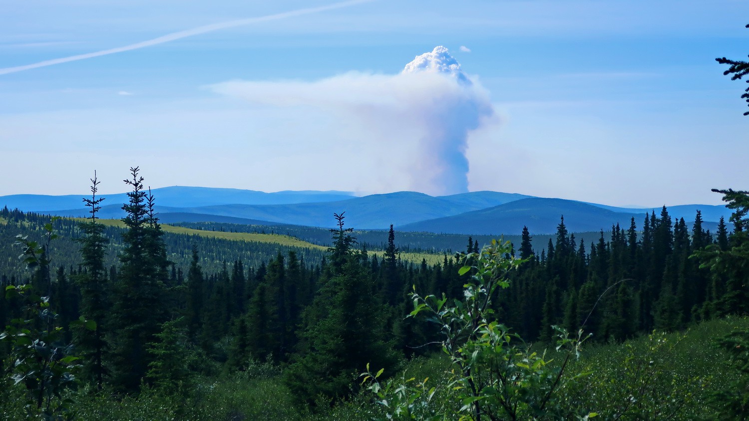 Wildfires seen from the descent of 977 meters high Wickersham Dome