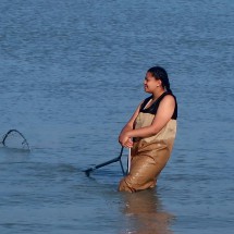 Native woman fishing in Kasilof River