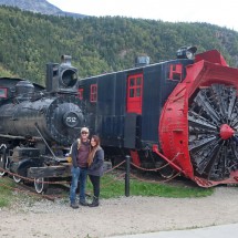 Ancient engine and snow blower on the port of Skagway