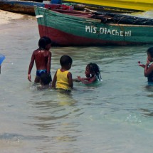 Kids playing on the beach of Chachahuate