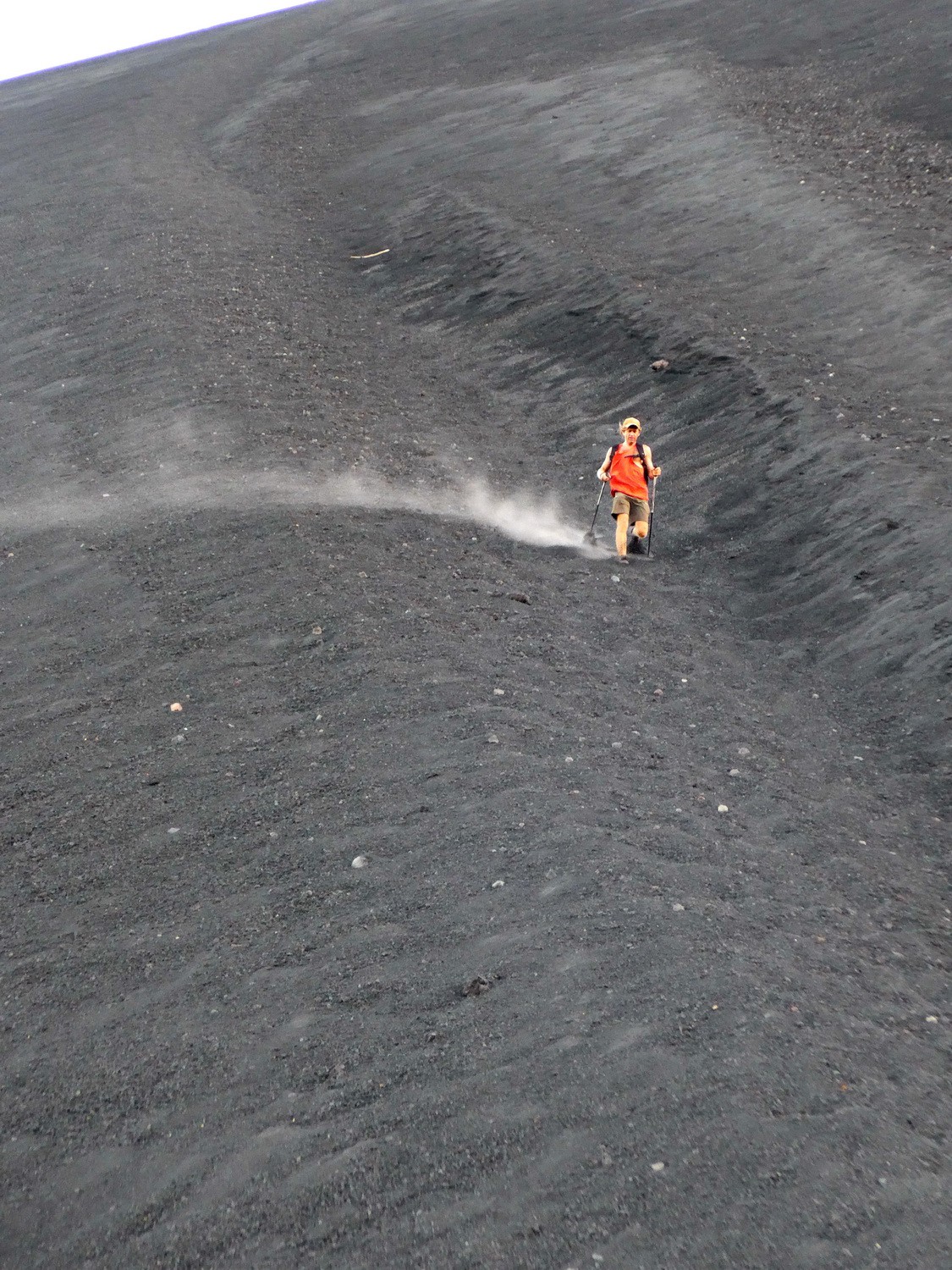 Rushing down the sandy gully of Cerro Negro which is also used for sand surfing