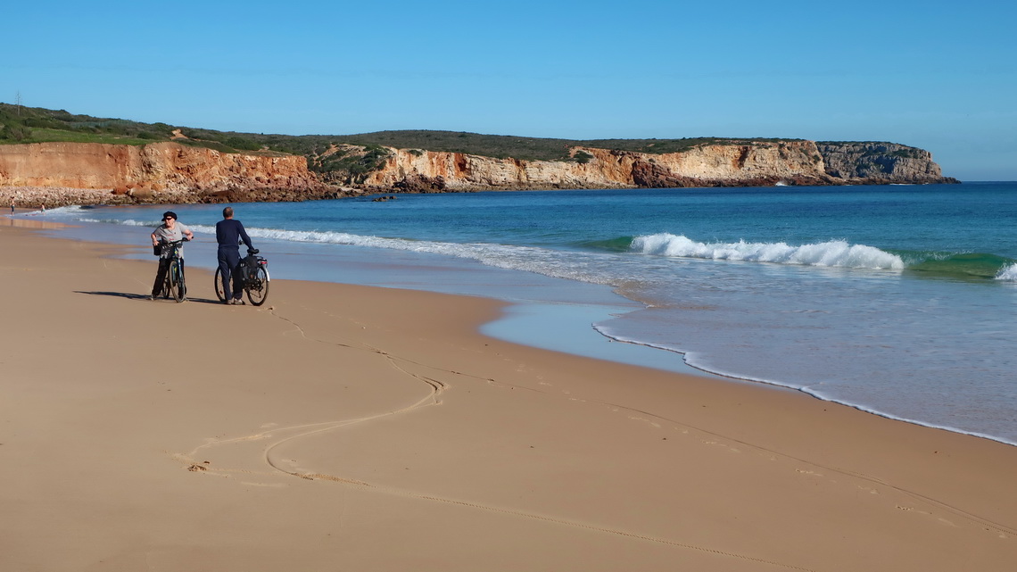 Marion and Tommy on the sandy beach Praia do Martinhal northeast of Sagres