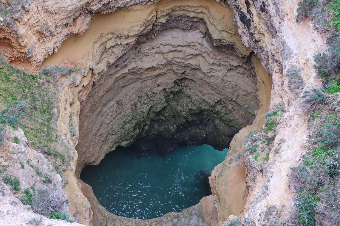Deep hole connected to the Atlantic Ocean  close to beach Praia do João de Arens