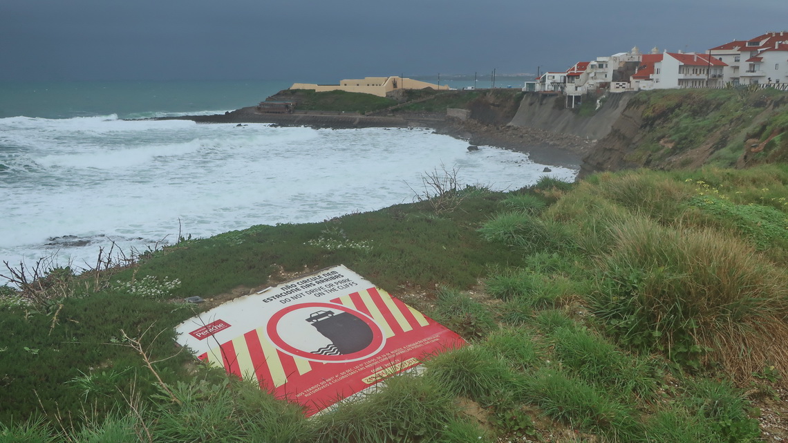 Coast of the little village Consolação with an interesting traffic sign