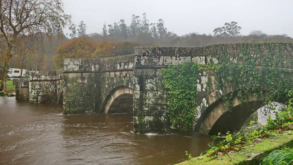 Historical roman bridge Ponte de Brandomil (30 kilometers northwest of Santiago de Compostela)