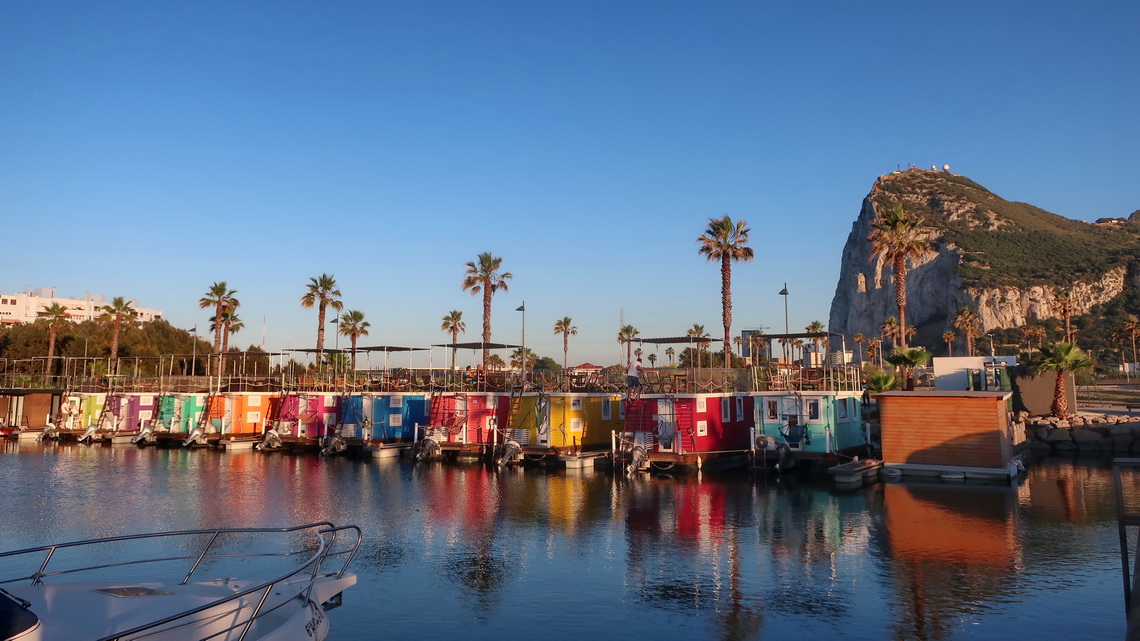 Houseboats in La Linea with the northern peak of Gibraltar's rock