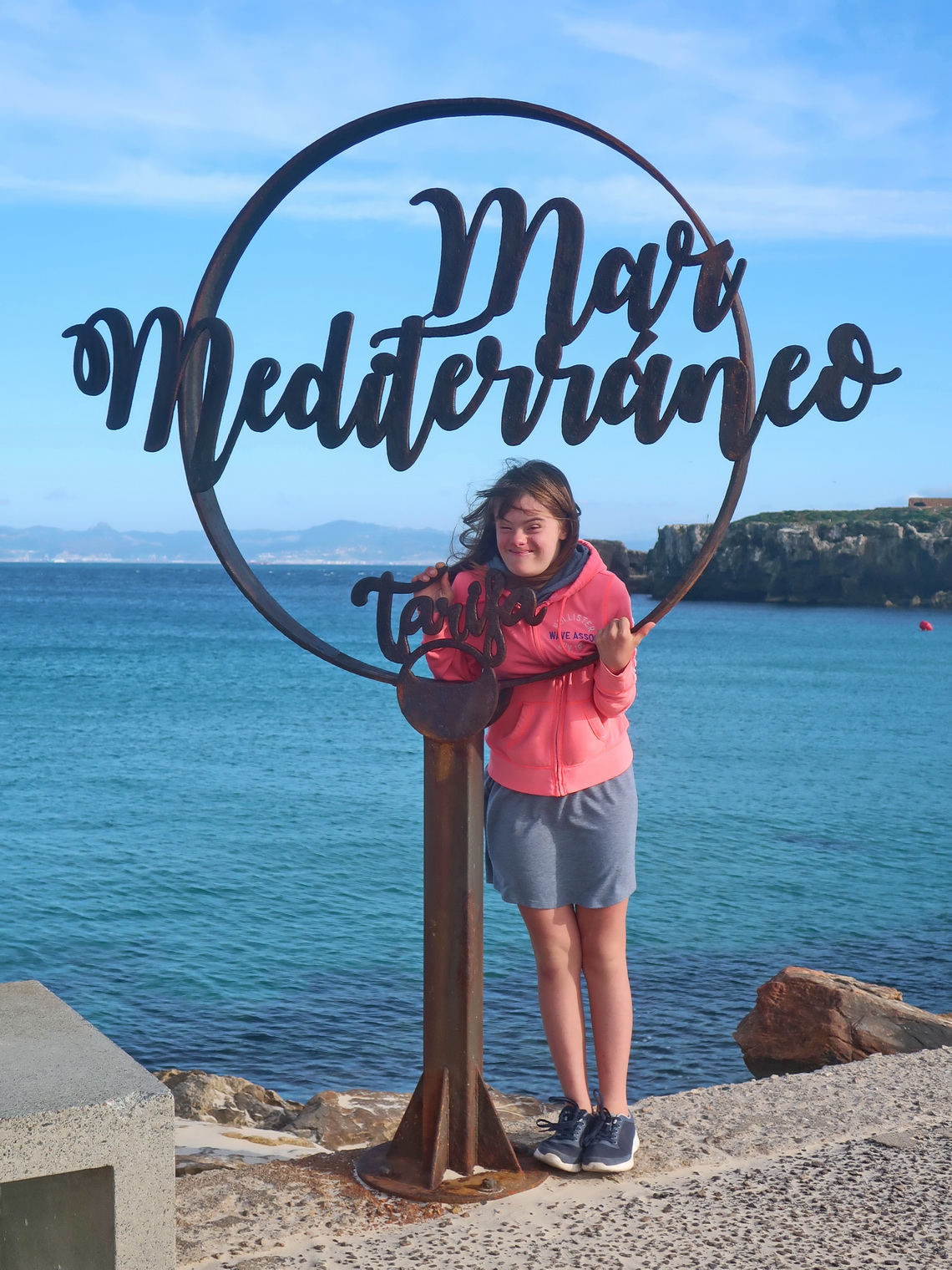 Sarah on the eastern side of the dam to the island Isla de las Palomas with the Mediterranean Sea