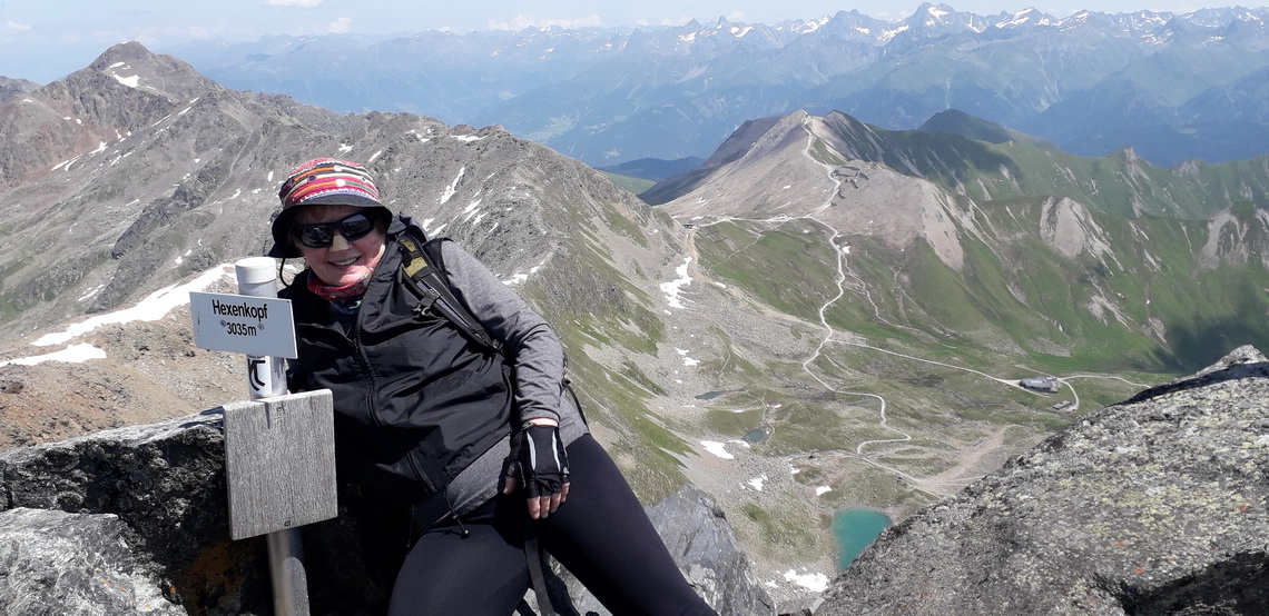 Marion on top of Hexenkopf with the Ötztaler Alps in the back