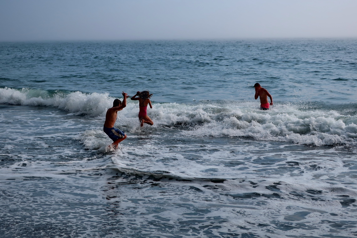 Kids in the cold Pacific - approximately 12°C