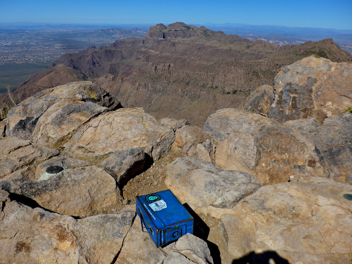 Summit of 1541 meters high Superstition Peak with Ridgeline and Flatiron in the background