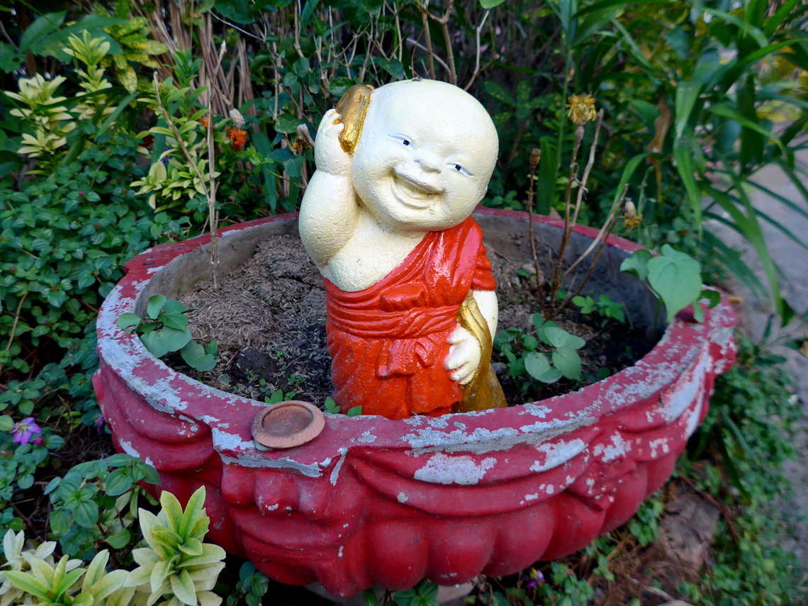 Baby Buddha with Smartphone in front of Wat Mung Muang