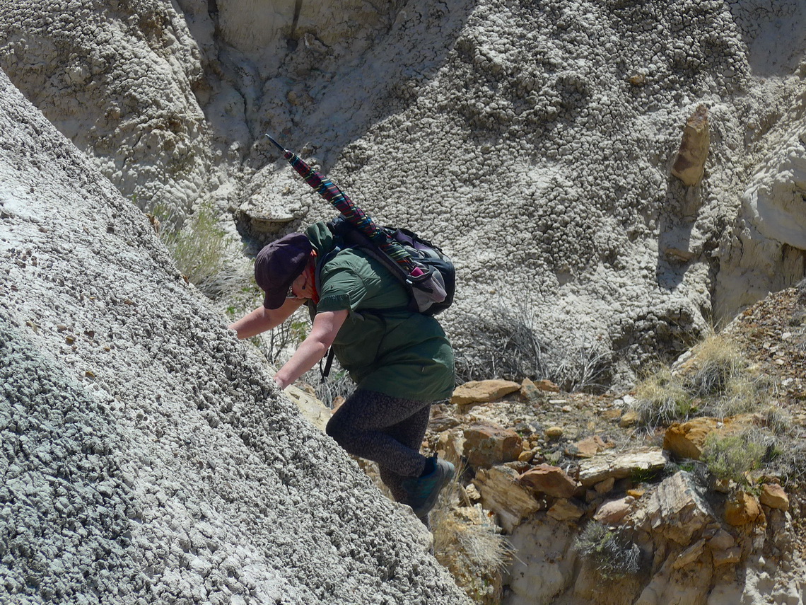 Marion climbing in the dirt