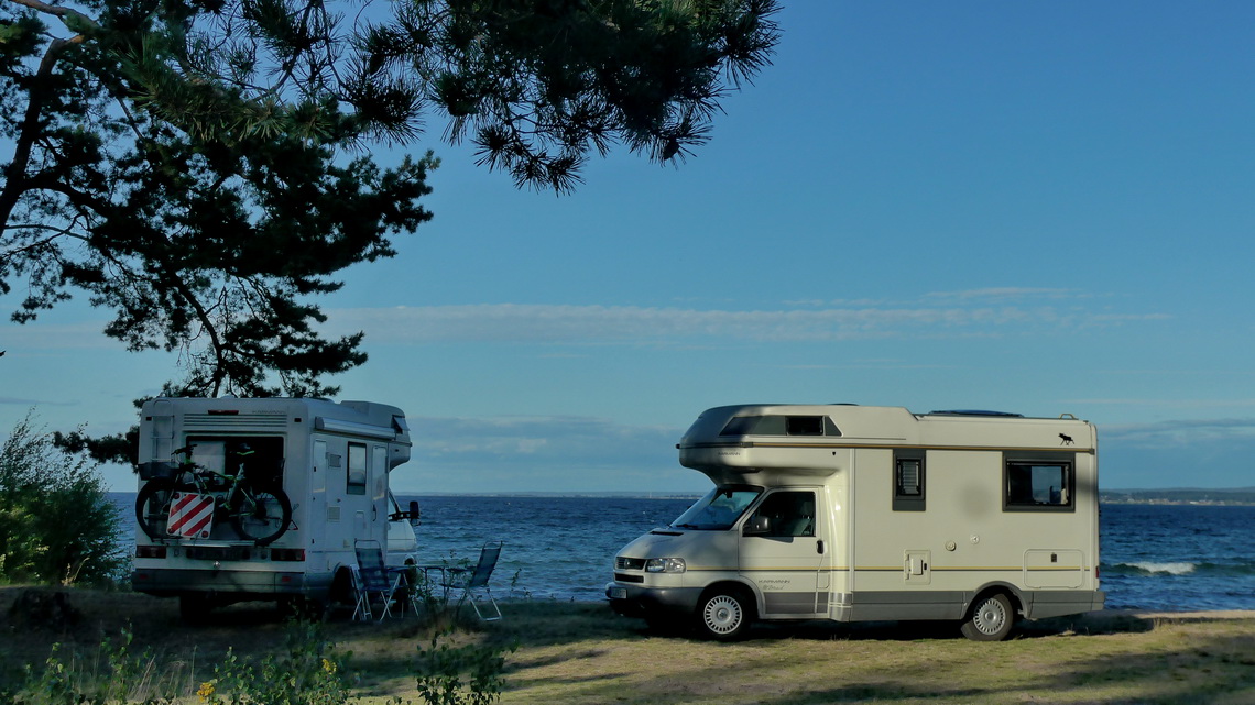 Two Karmann Volkswagen on shore of lake Vättern - Elli and Roland's van on the right